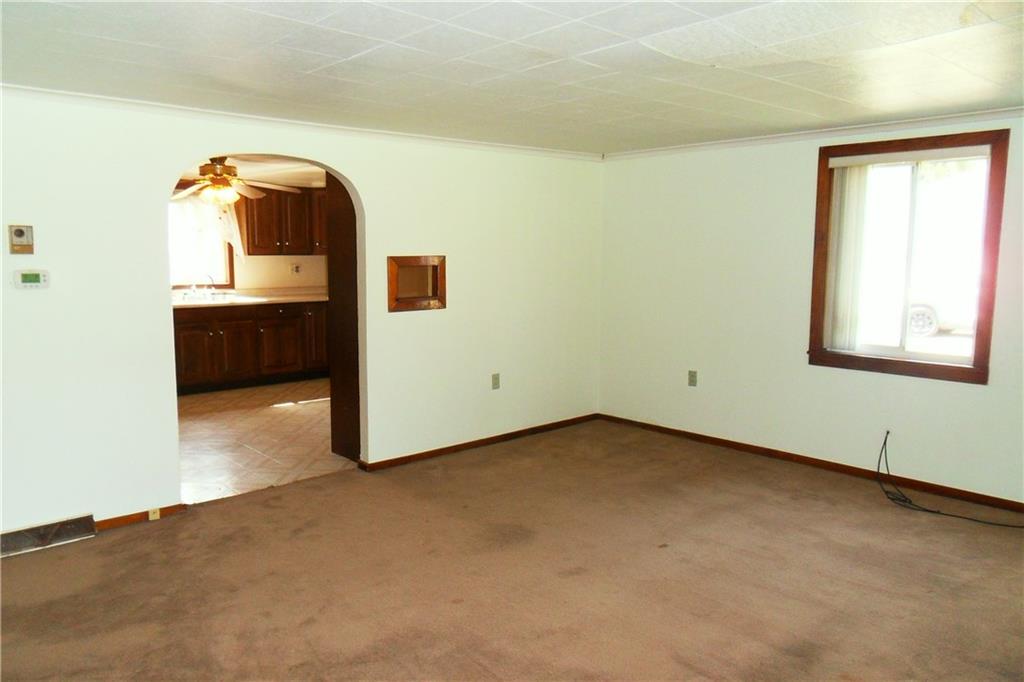 3722 North Balsiger Road Vandergrift, PA 15690 - Photo 12 of 18 an empty room with a window and mirror