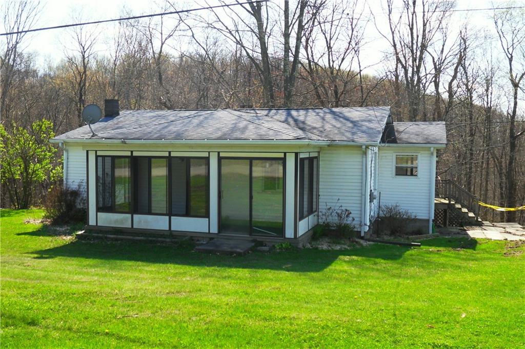 3722 North Balsiger Road Vandergrift, PA 15690 - Photo 2 of 18 a backyard of a house with yard and trampoline