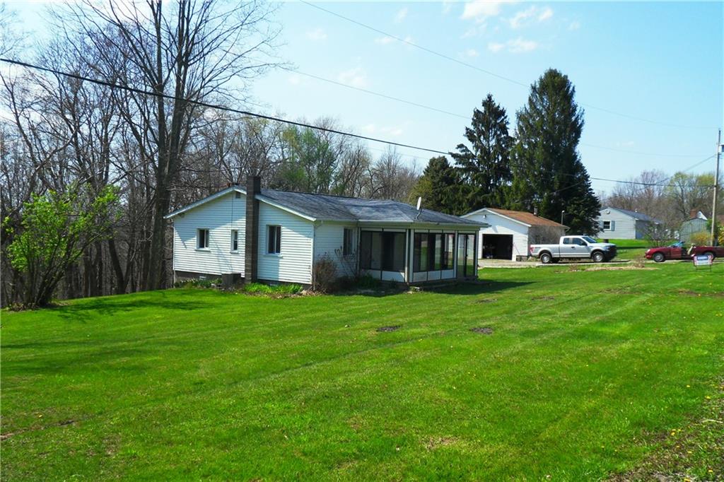 3722 North Balsiger Road Vandergrift, PA 15690 - Photo 3 of 18 a front view of a house with a garden