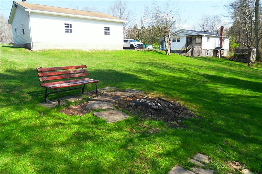 3722 North Balsiger Road Vandergrift, PA 15690 - Photo 8 of 18 a backyard of a house with table and chairs