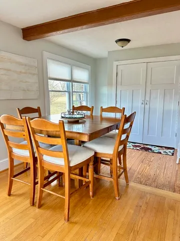 a view of a house with a yard porch and sitting area