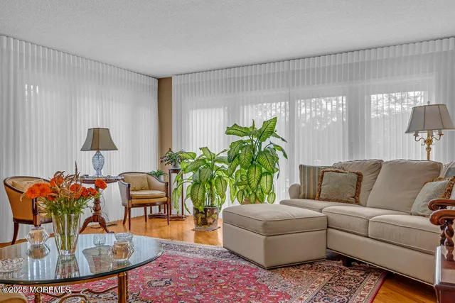 a bedroom with a bed and a desk