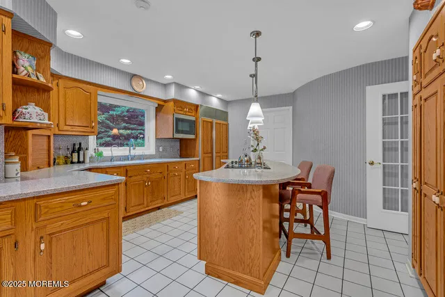 a bedroom with a bed and a table