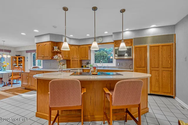 a view of a house with backyard sitting area and garden