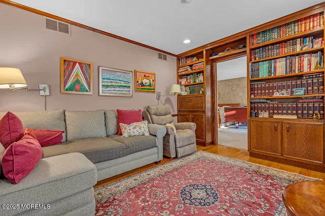 an aerial view of residential house with outdoor space and swimming pool