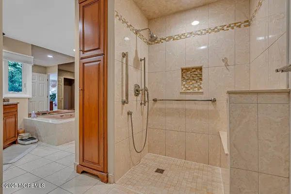 an aerial view of a house with a yard and garden