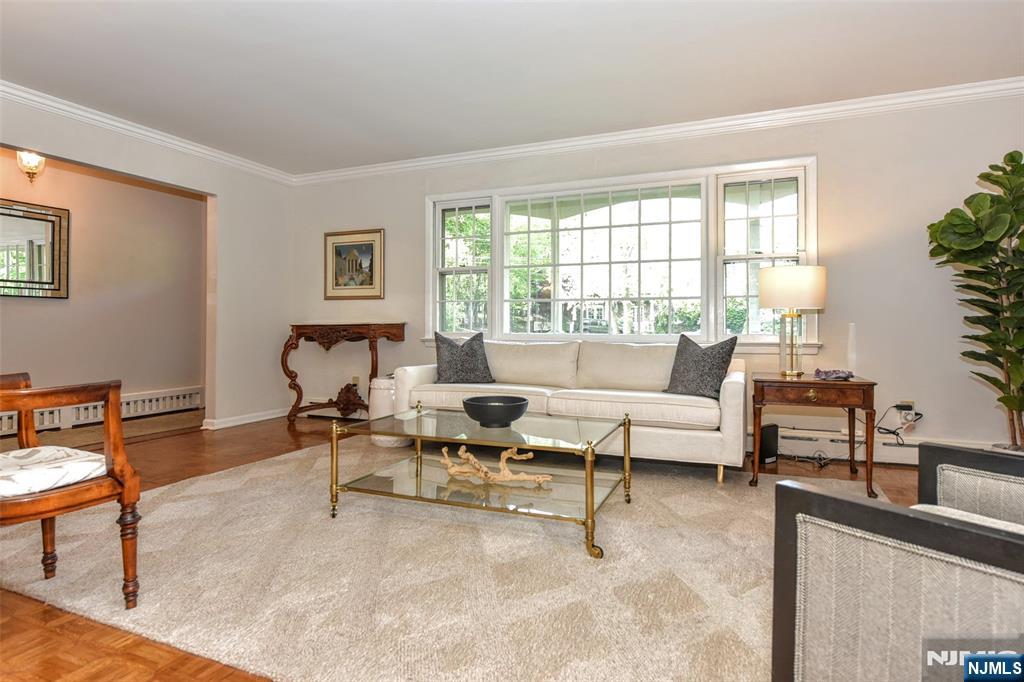 60 Dimmig Road Upper Saddle River, NJ 07458 - Photo 12 of 40 a living room with furniture and a large window
