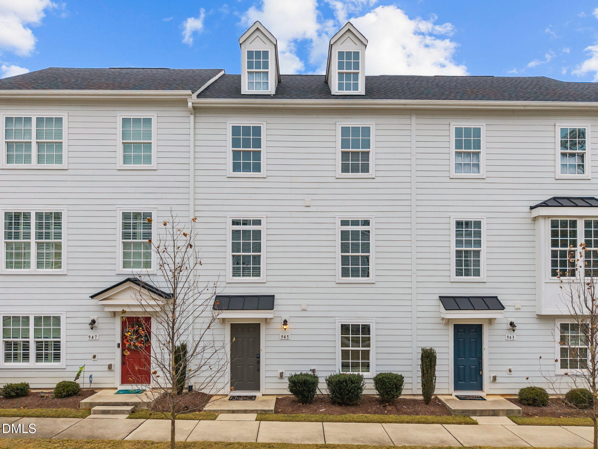 945 Anthem Lane Durham, NC 27713 - Photo 1 of 51 a view of a brick house with many windows