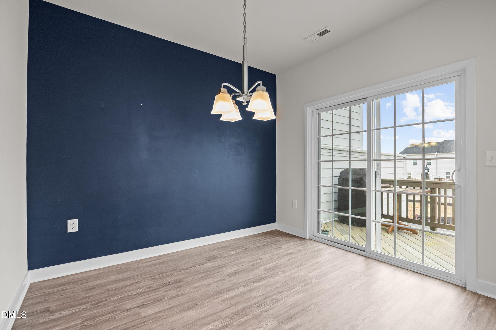 945 Anthem Lane Durham, NC 27713 - Photo 11 of 51 a view of a livingroom with a staircase