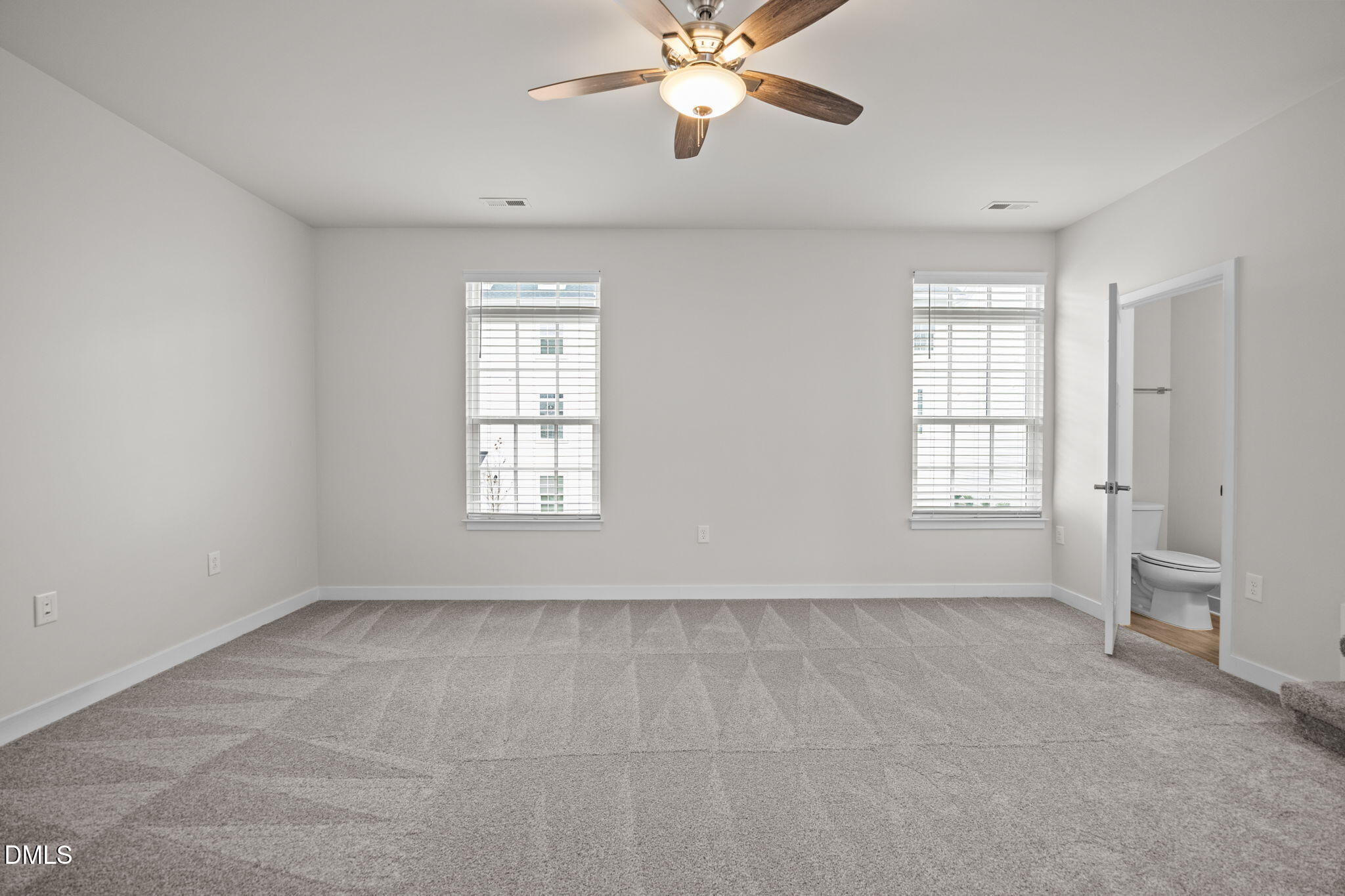945 Anthem Lane Durham, NC 27713 - Photo 14 of 51 a view of an empty room with a window