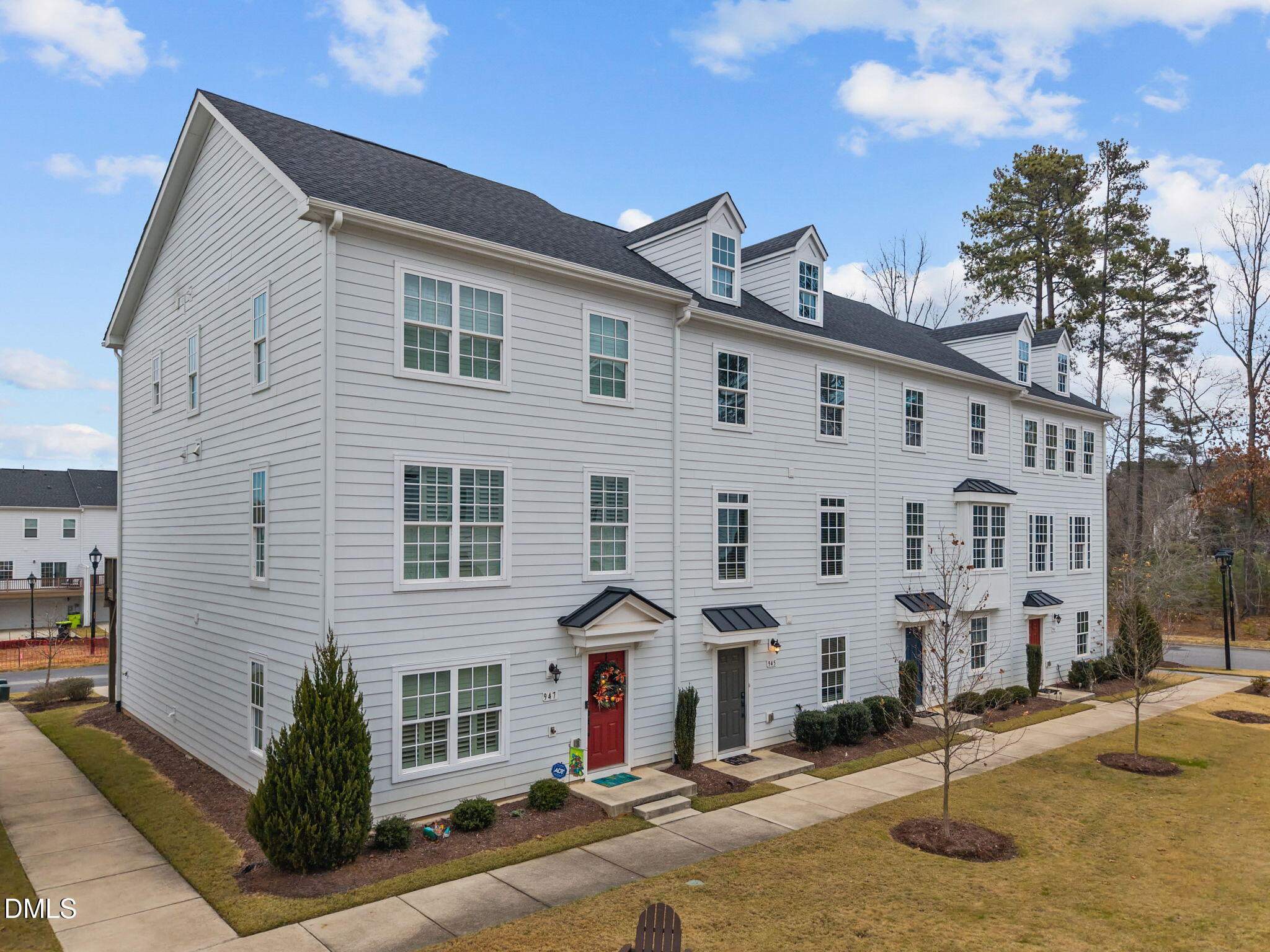 945 Anthem Lane Durham, NC 27713 - Photo 2 of 51 a front view of a house with a yard