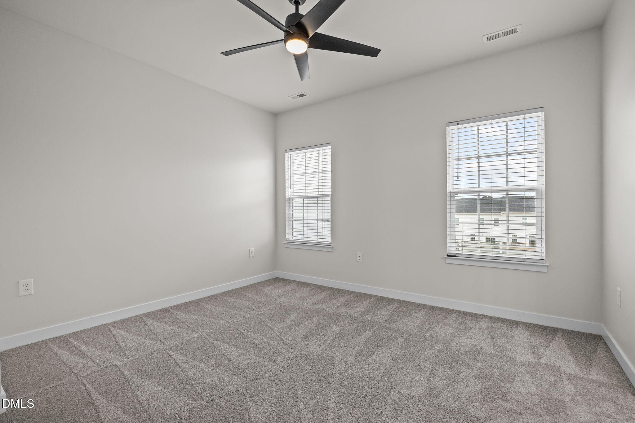 945 Anthem Lane Durham, NC 27713 - Photo 21 of 51 a view of an empty room with a window