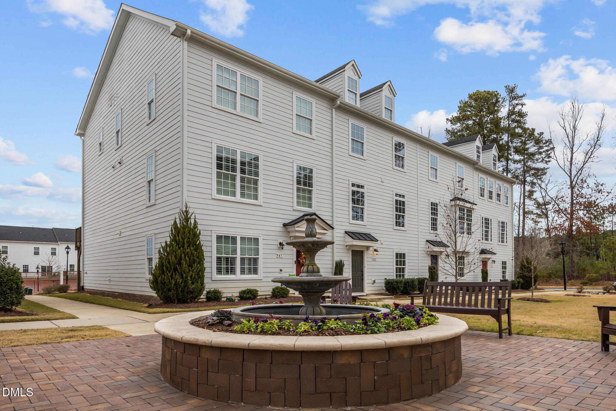 945 Anthem Lane Durham, NC 27713 - Photo 50 of 51 a front view of a house with a garden and patio