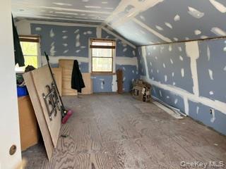 106 Lewis Road East Quogue, NY 11942 - Photo 12 of 12 a view of a room with gym equipment