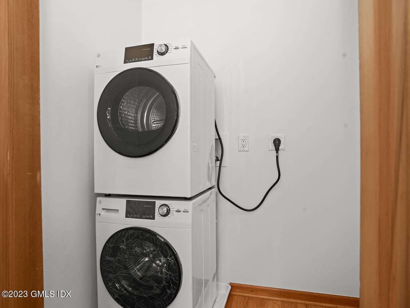 63 Cos Cob Avenue, Unit B Cos Cob, CT 06807 - Photo 11 of 14 a utility room with dryer and washer