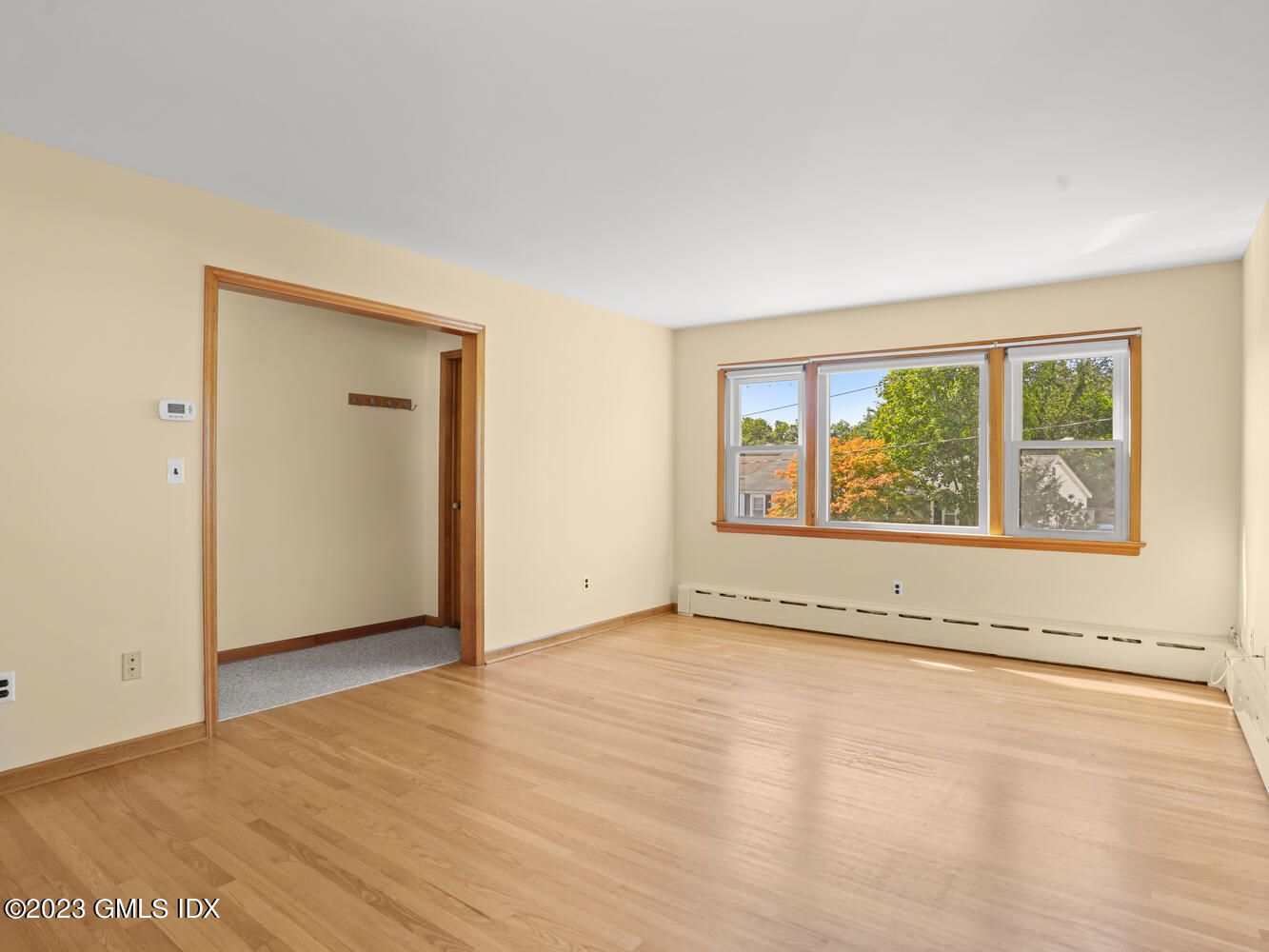 63 Cos Cob Avenue, Unit B Cos Cob, CT 06807 - Photo 5 of 14 an empty room with a window