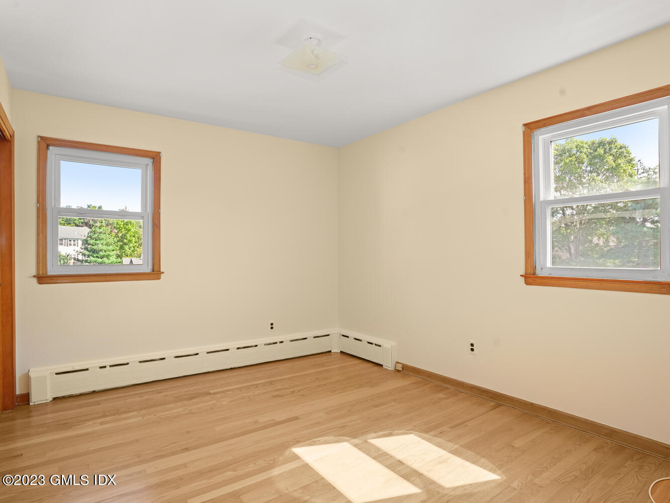 63 Cos Cob Avenue, Unit B Cos Cob, CT 06807 - Photo 8 of 14 an empty room with a window