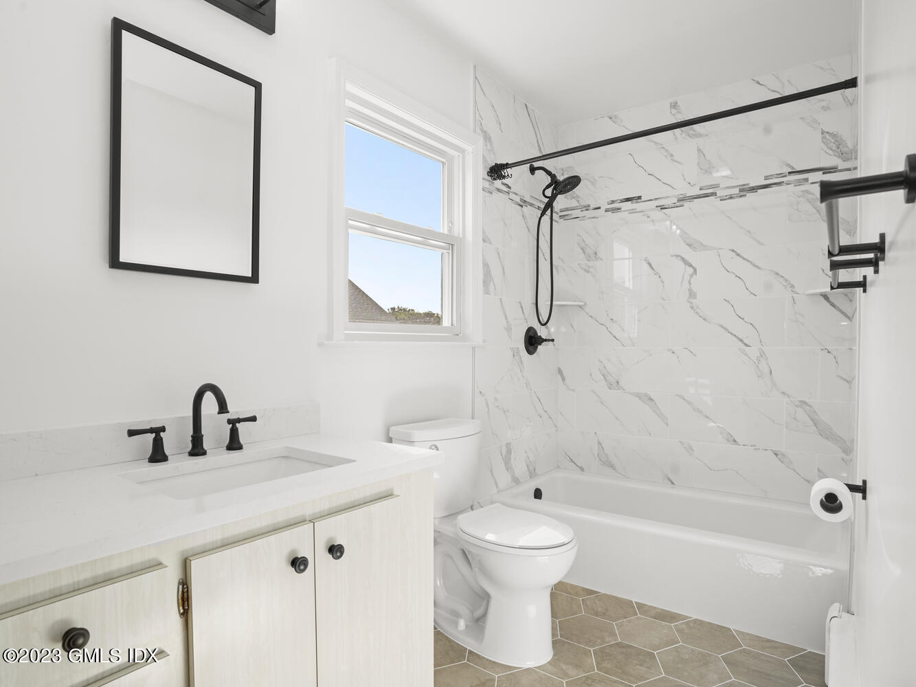 63 Cos Cob Avenue, Unit B Cos Cob, CT 06807 - Photo 10 of 14 a bathroom with a sink toilet and shower