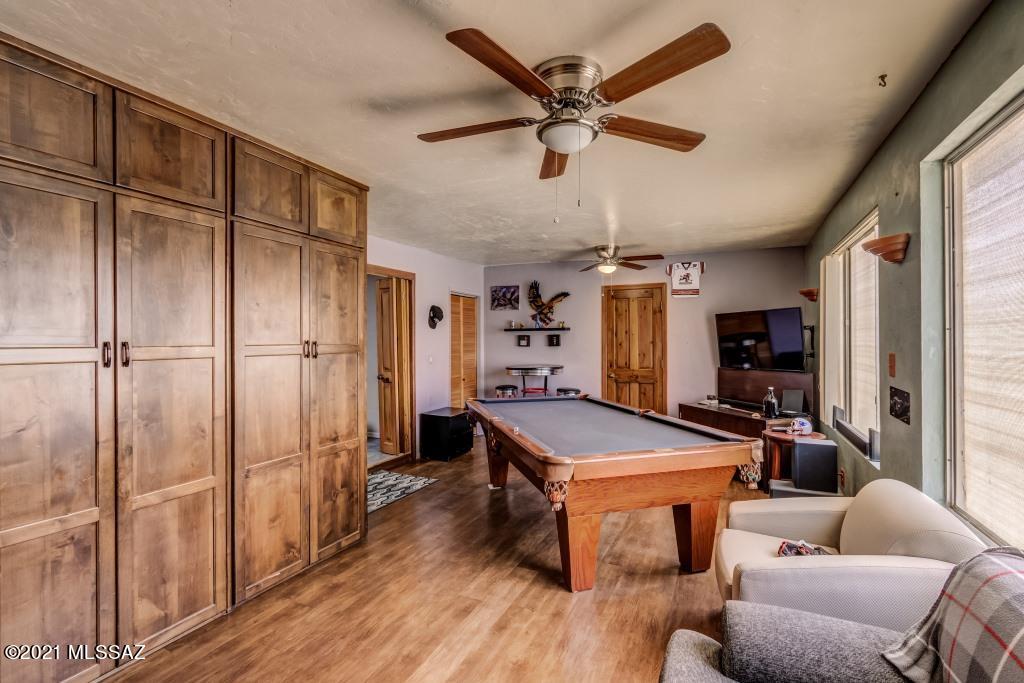 1901 West Romany Road Tucson, AZ 85713 - Photo 29 of 37 a room with furniture a ceiling fan and a window