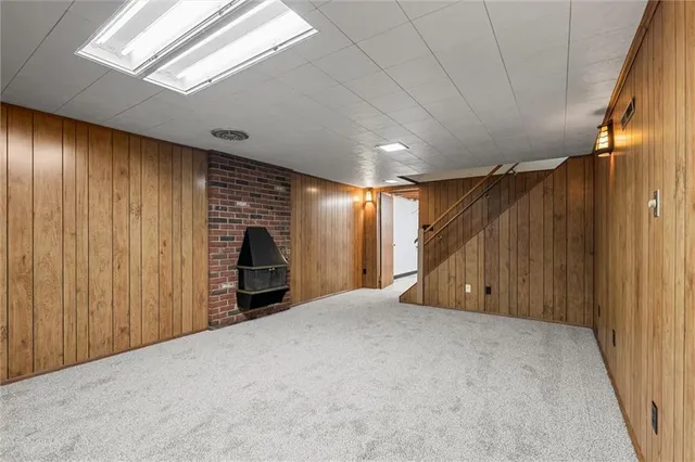 a view of an empty room with a garage