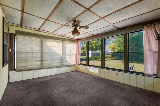 a view of a room with a large window