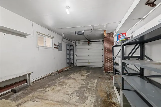 a view of house with a yard