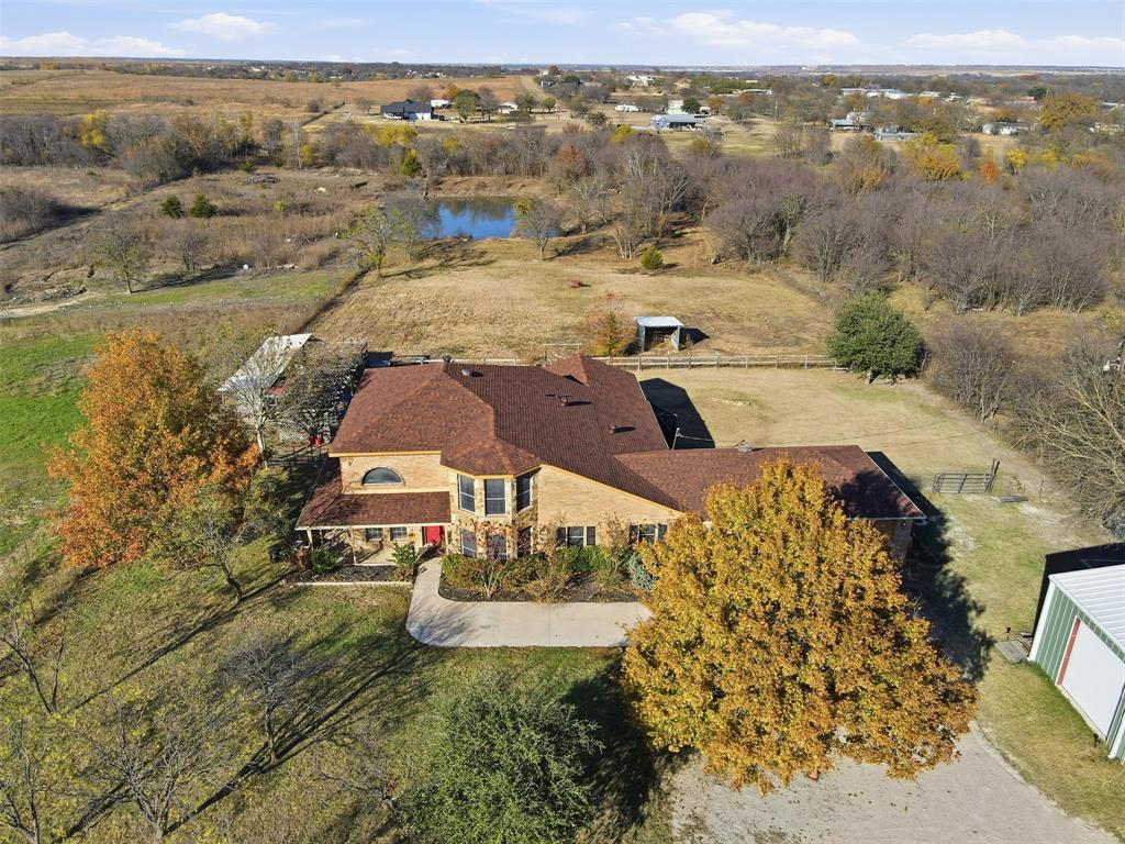 5824 Sky Road Joshua, TX 76058 - Photo 1 of 40 an aerial view of residential houses with outdoor space