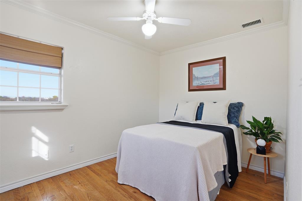 5824 Sky Road Joshua, TX 76058 - Photo 21 of 40 a bedroom with a bed and a window