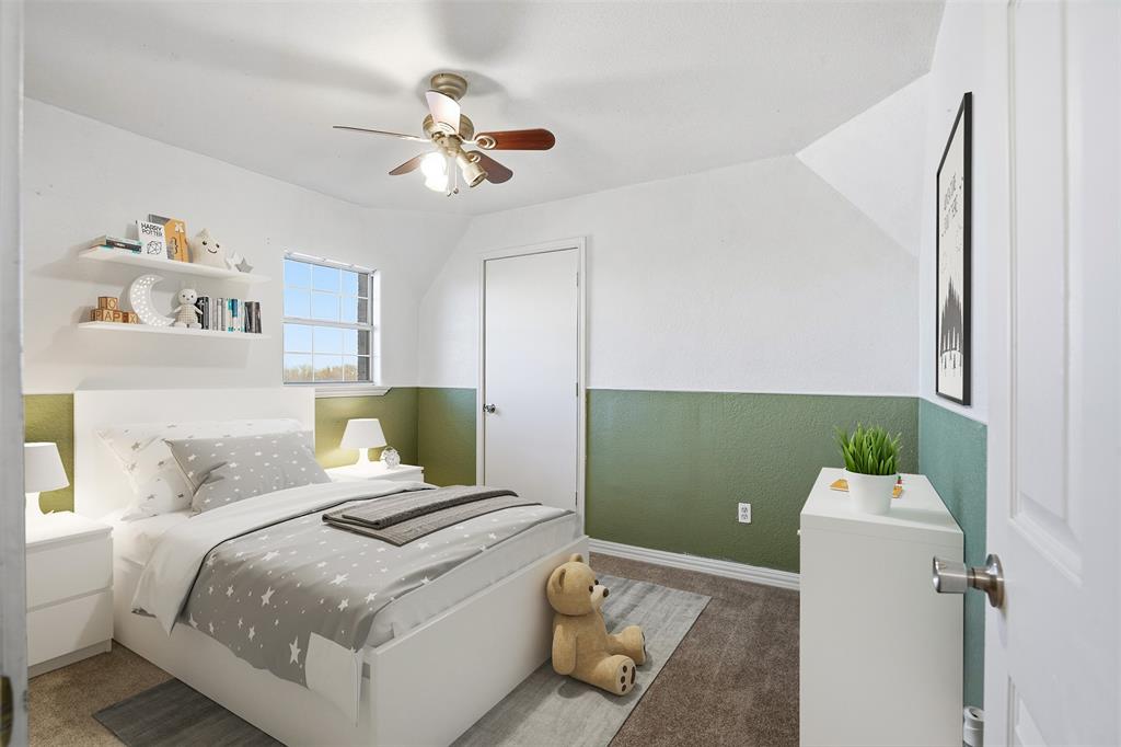 5824 Sky Road Joshua, TX 76058 - Photo 22 of 40 a bedroom with a bed and a chandelier