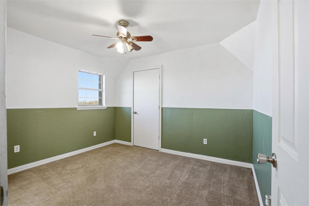 5824 Sky Road Joshua, TX 76058 - Photo 23 of 40 a view of a livingroom with an empty space and a ceiling fan