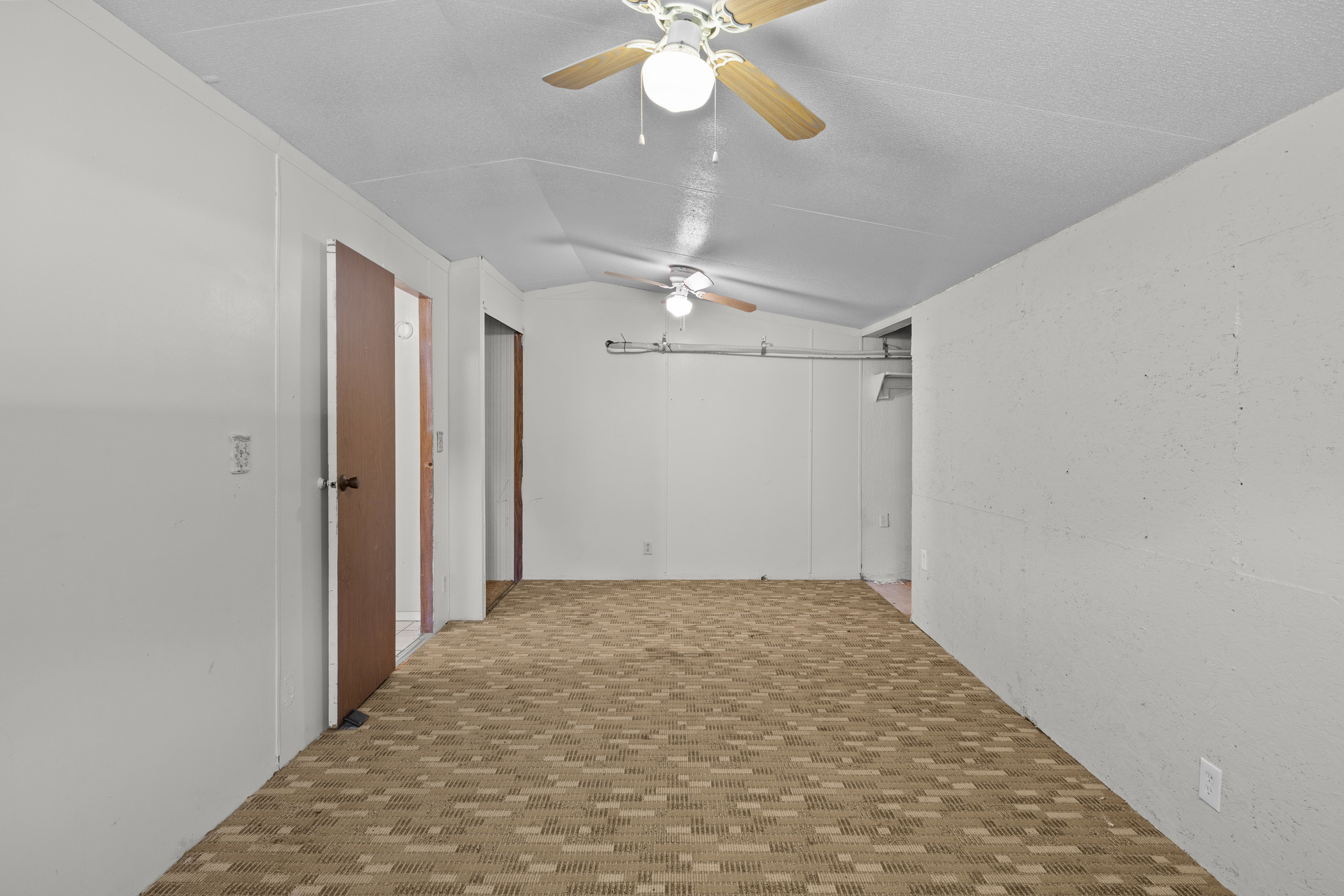 147 Community Center Road Rosanky, TX 78953 - Photo 18 of 33 Hallway with lofted ceiling