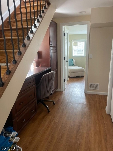 1409 River Road Belmar, NJ 07719 - Photo 14 of 22 a view of entryway and hall with wooden floor