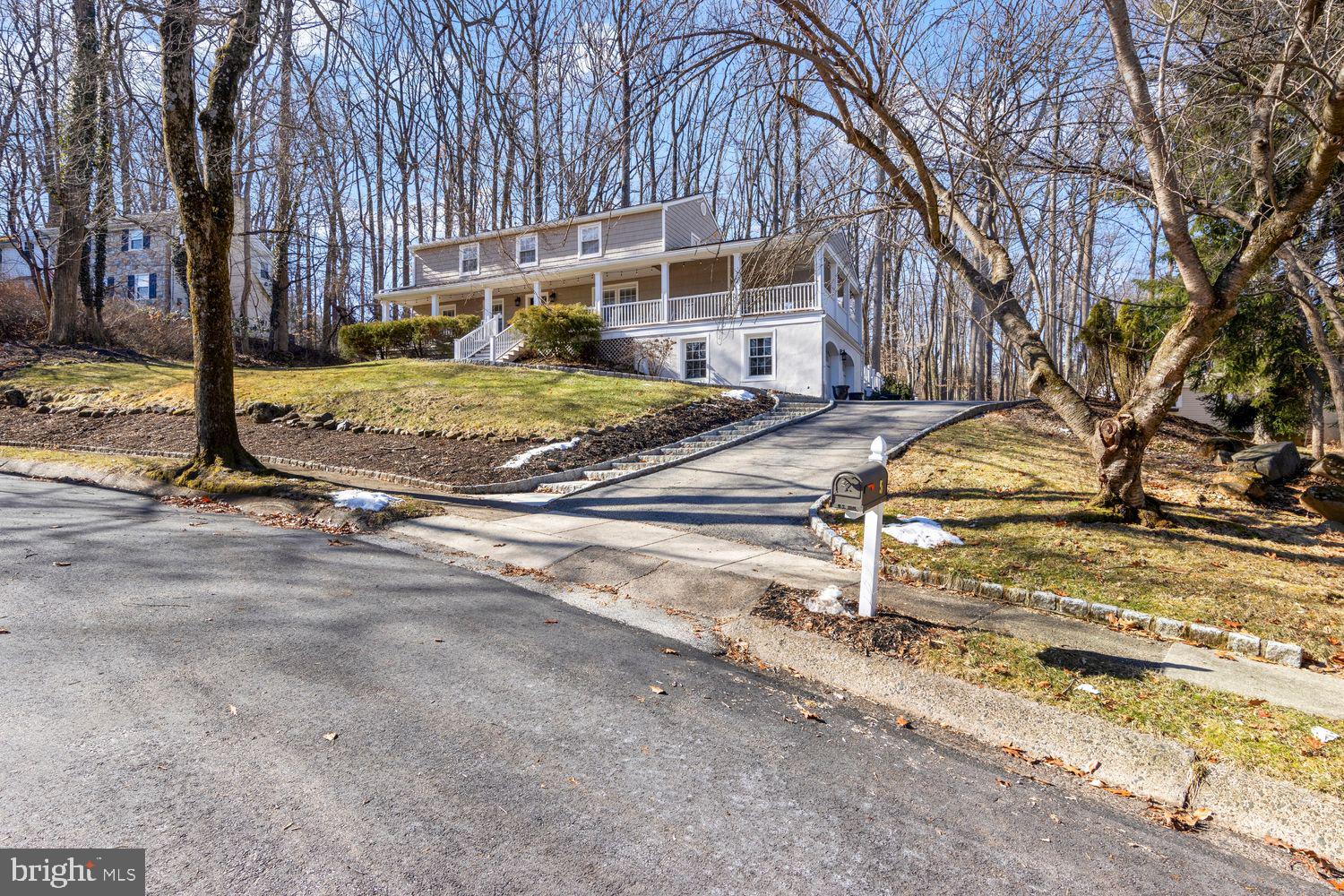 5 Crestview Circle Wayne, PA 19087 - Photo 1 of 38 a view of a house with snow on the road