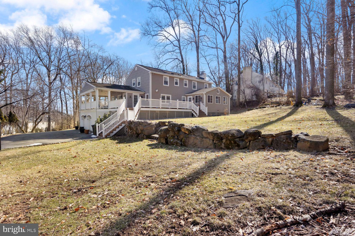 5 Crestview Circle Wayne, PA 19087 - Photo 8 of 38 a view of a yard covered in snow