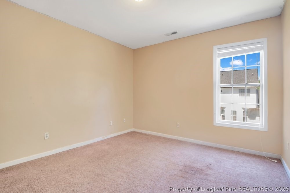10 Pender Road Spring Lake, NC 28390 - Photo 17 of 35 an empty room with a window