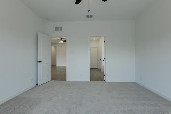 wooden floor and cabinet in an empty room