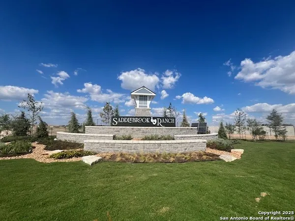 a view of a lake with a building in the background