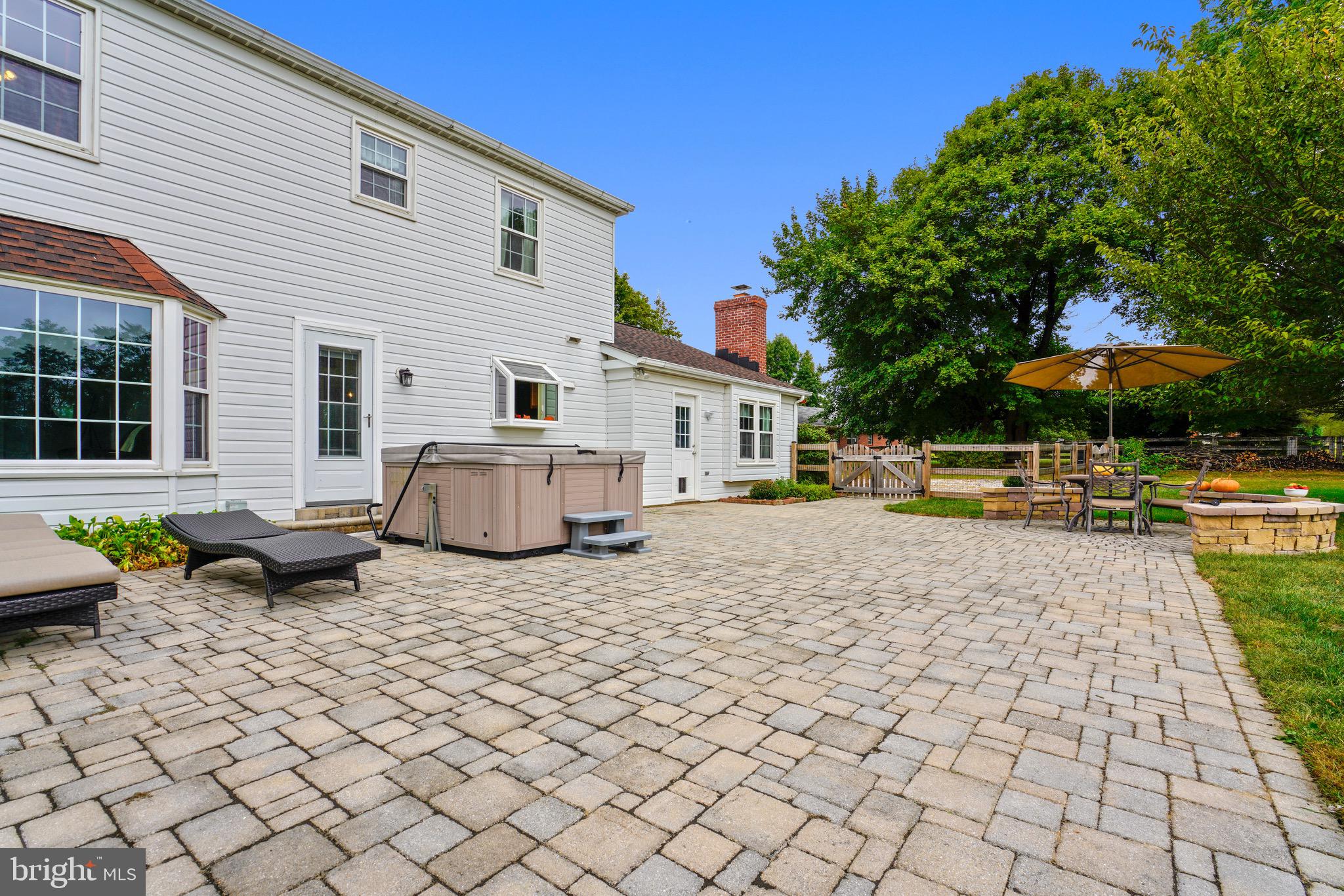509 Sullivan Road Westminster, MD 21157 - Photo 5 of 36 Large rear patio, Hot tub stays! And Fish pond