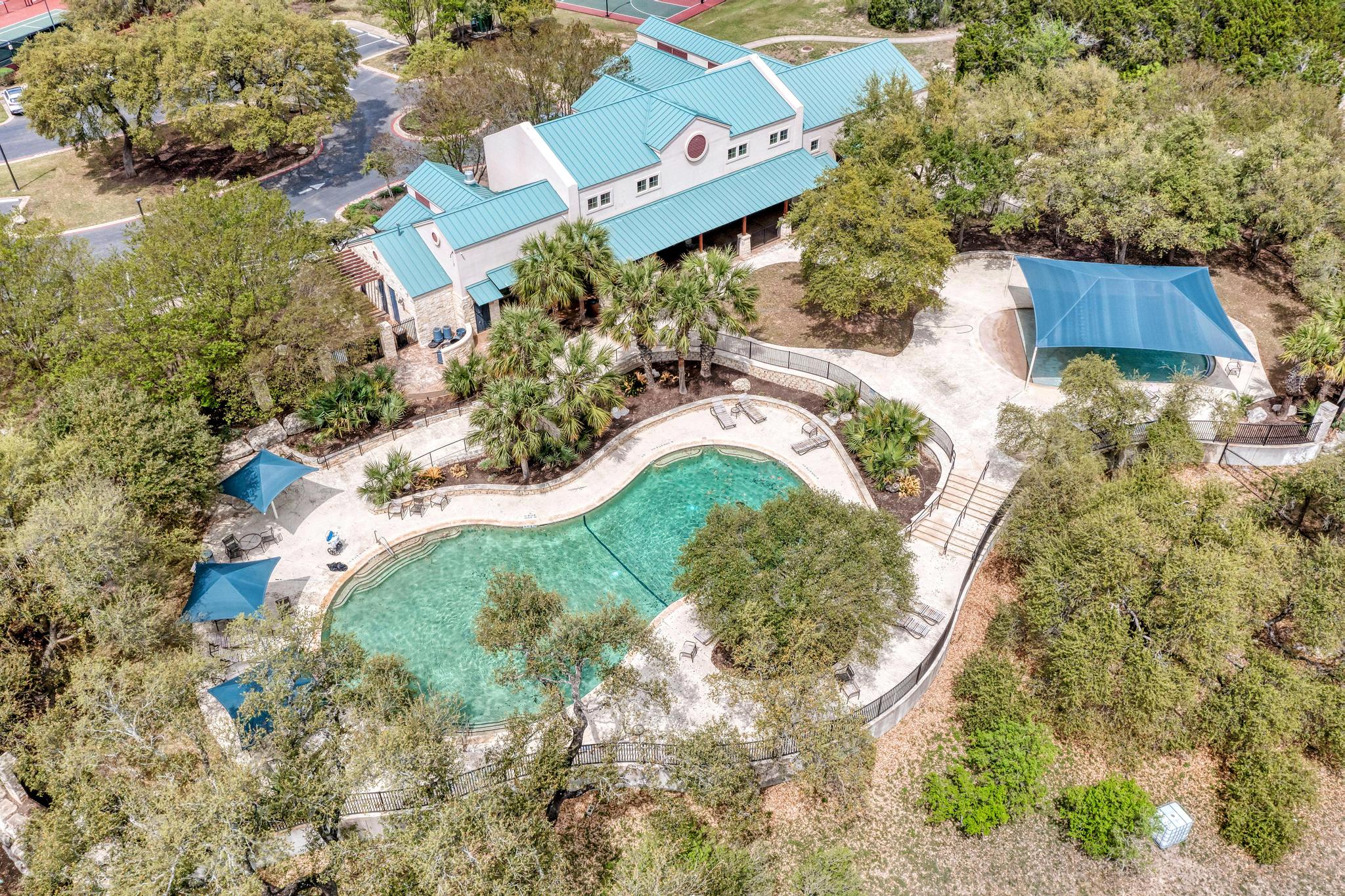 2601 North Quinlan Park Road, Unit 506 Austin, TX 78732 - Photo 36 of 39 Steiner Ranch pool and community center
