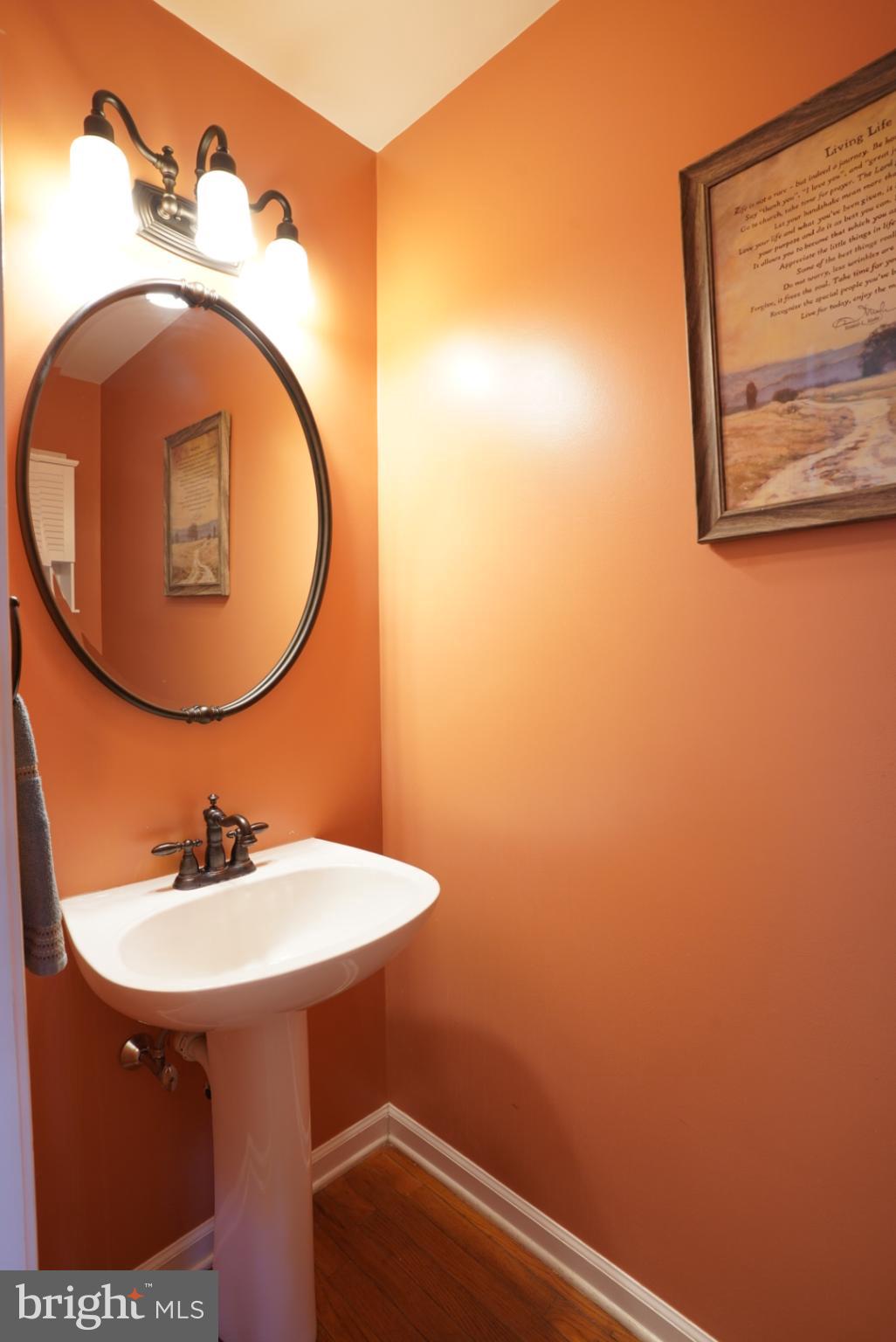 380 Styer Road Glenmoore, PA 19343 - Photo 16 of 33 Charming powder room with warm hues.