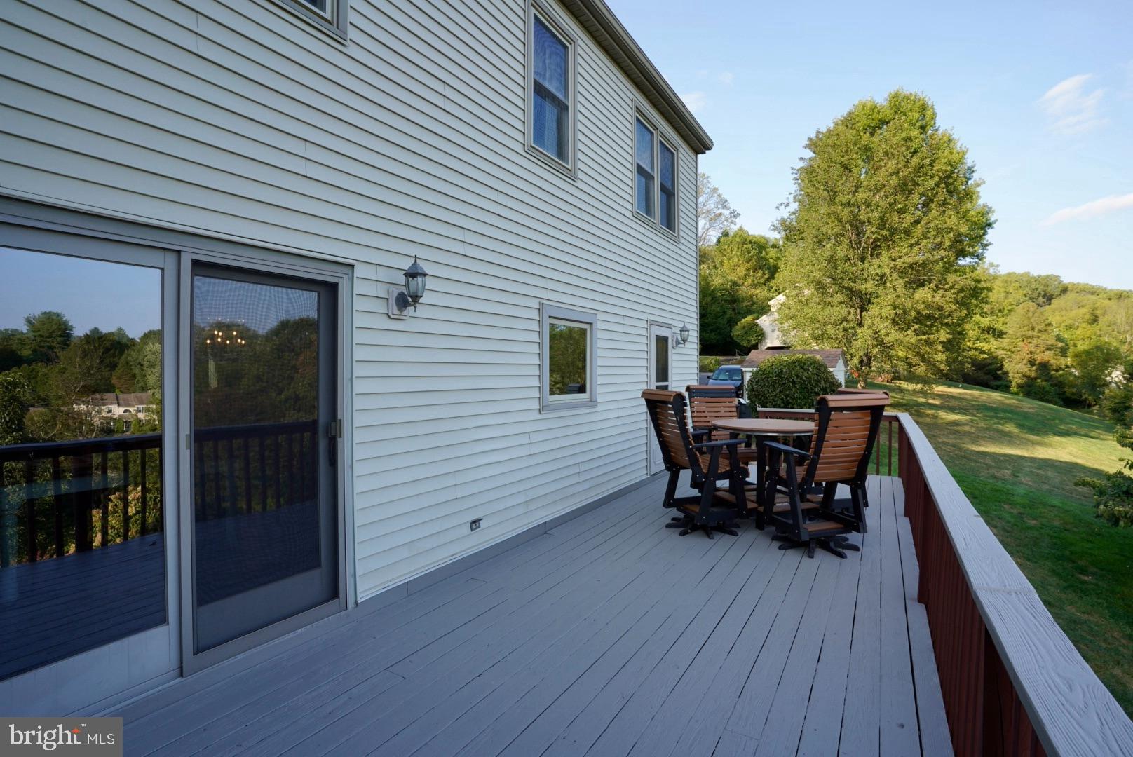 380 Styer Road Glenmoore, PA 19343 - Photo 17 of 33 Spacious deck with scenic hillside views.