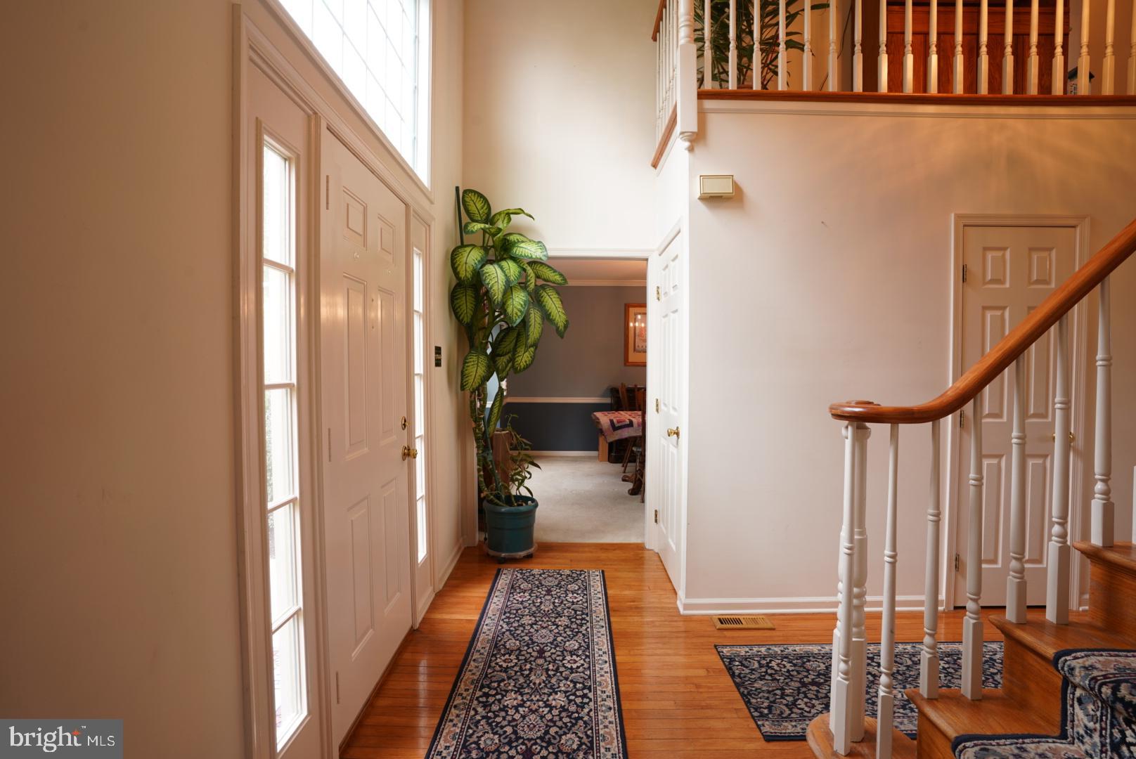 380 Styer Road Glenmoore, PA 19343 - Photo 7 of 33 Inviting foyer with elegant staircase charm.