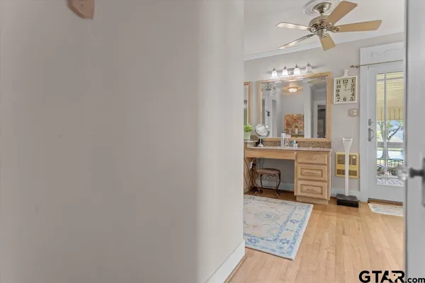 a room with kitchen island and a chandelier