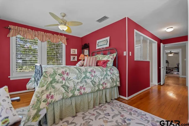 a building outdoor space with patio furniture and potted plants