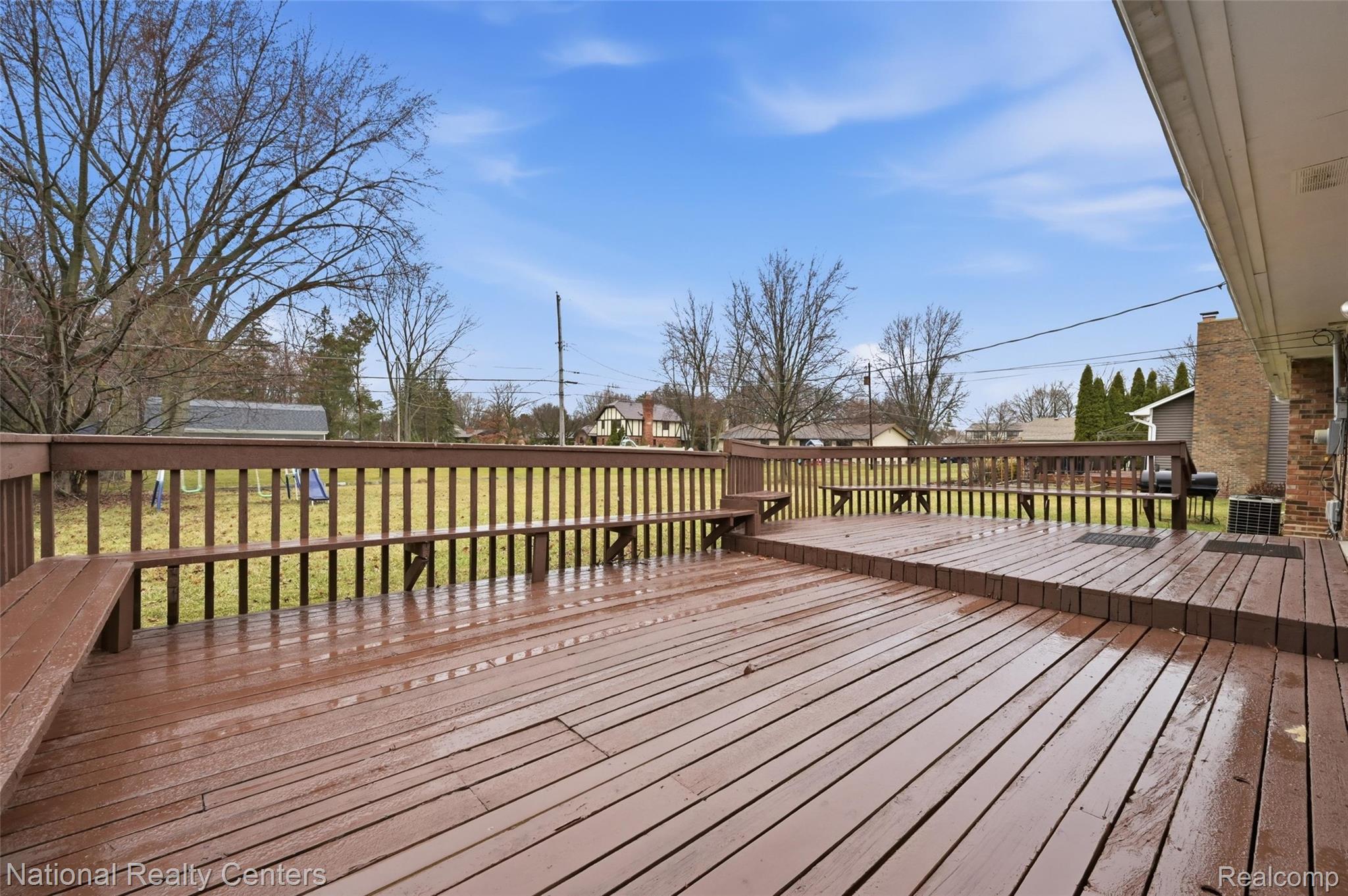 37625 Ryan Road Sterling Heights, MI 48310 - Photo 28 of 30 Wooden deck featuring a residential view and a yard