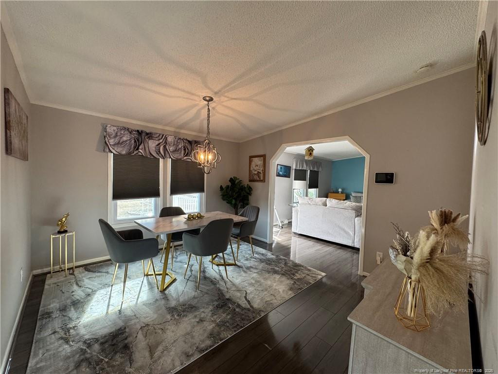 100 L Wallace McClean Road Raeford, NC 28376 - Photo 15 of 38 a living room with furniture a rug and white walls