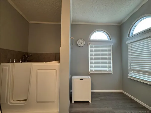 a view of livingroom with furniture and window