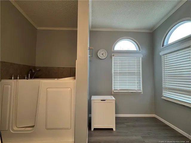 a view of livingroom with furniture and window