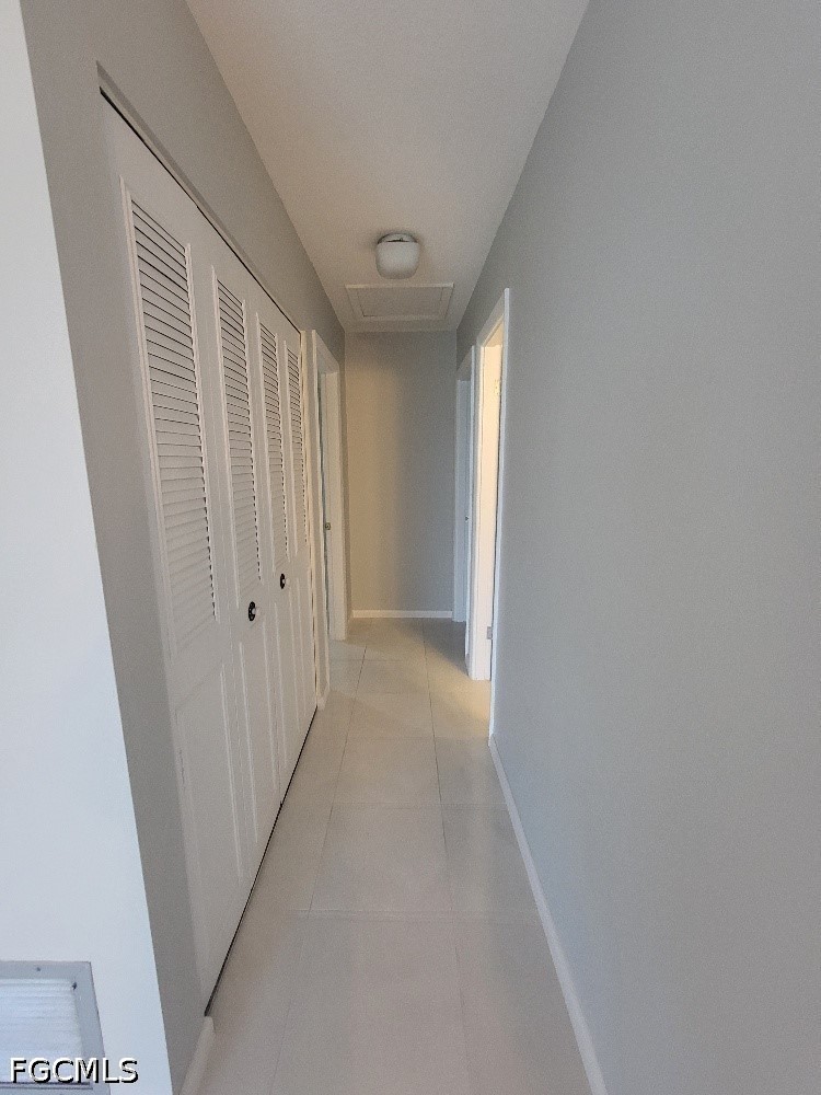 347 Richland Road Lehigh Acres, FL 33936 - Photo 7 of 16 a view of a hallway