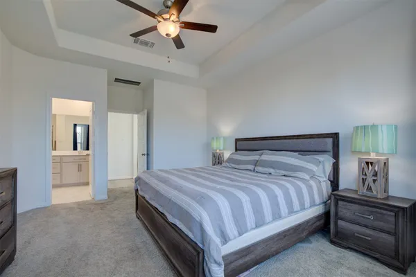 a bedroom with a bed and closet